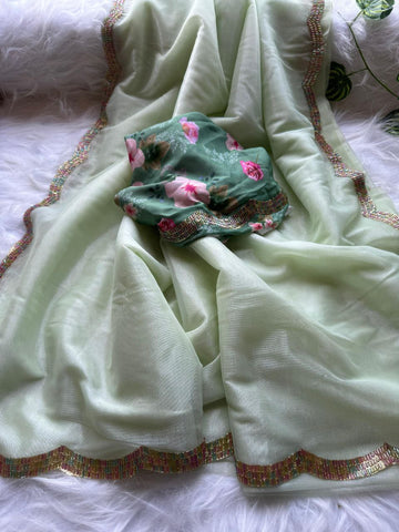 Soft And Shining Tissue Silver Net Party Wear Saree Soft And Shining Tissue Silver Net Party Wear Saree