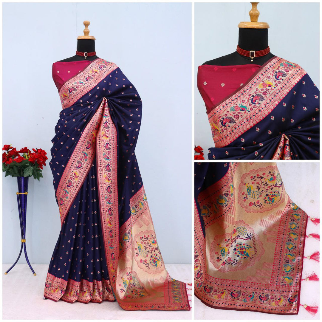 Has floral and peacock motifs on the zari border and pallu  NAVY  BLUE