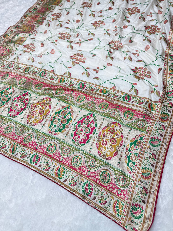 Elegant White Woven Saree with Intricate Floral Motifs &amp; Rich Zari Border