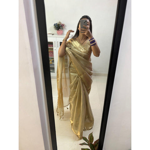beautiful banarsi golden tissue silk saree with antic gold border