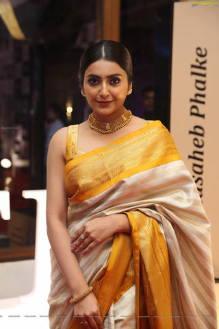 GOLD AND WHITE BEAUTIFUL SAREE