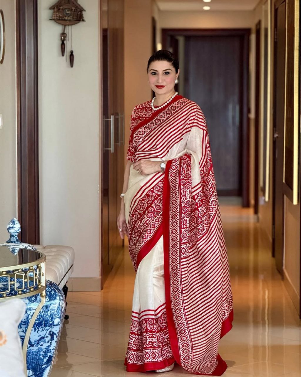 Elegant White &amp; Red Traditional Printed Saree with Ethnic Border